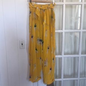 100% Silk Ralph Lauren women’s trousers with novelty tennis player print.